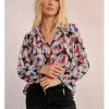 Blusa de manga larga con estampado y lazada