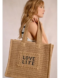 Bolso de rafia trenzada estampado texto