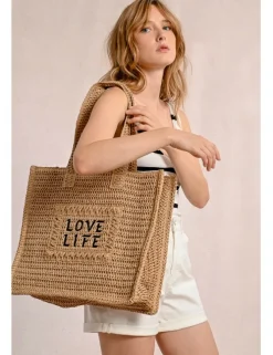 Bolso de rafia trenzada estampado texto
