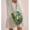 Bolso-neceser de mano estampado tropical