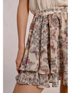 Falda corta con estampado y volantes
