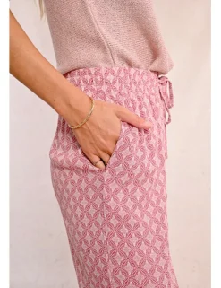 Pantalón largo con estampado y lazada