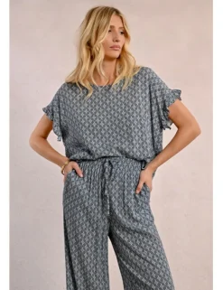 Pantalón largo con estampado y lazada