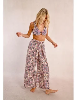 Pantalón largo con lazada y estampado