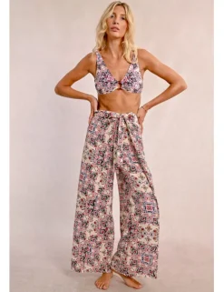 Pantalón largo con lazada y estampado