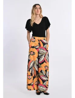 Pantalón largo de perneras anchas con estampado