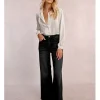 Pantalón vaquero perneras anchas