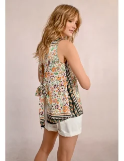 Top sin manga con estampado y lazada