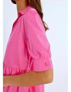 Vestido camisero con cuello y volantes