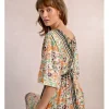 Vestido corto con estampado y lazada