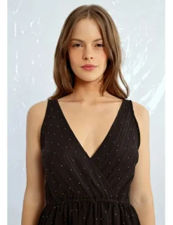 Vestido corto cruzado sin manga con volantes
