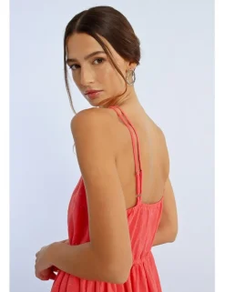 Vestido corto cruzado sin manga con volantes