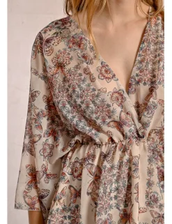 Vestido de manga mariposa con estampado y volantes