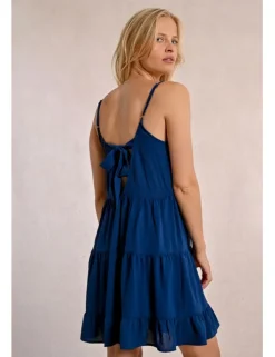 Vestido de tirantes con volantes y lazada