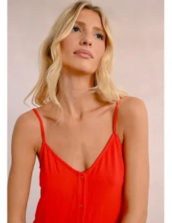 Vestido de tirantes con volantes y lazada