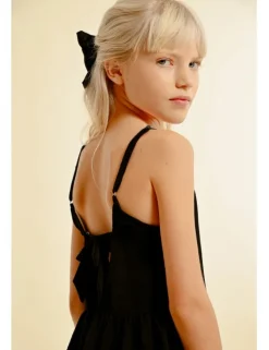 Vestido de tirantes volantes y lazada