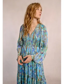 Vestido largo con estampado y volantes