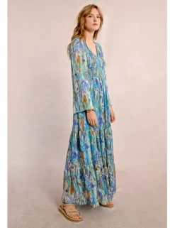 Vestido largo con estampado y volantes
