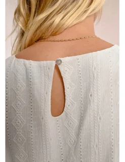 Vestido largo en tejido bordado con volantes